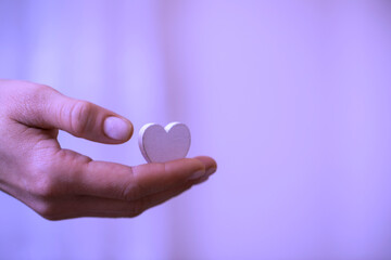 Woman hand white heart. Love concept. 