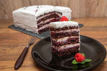 Chocolate raspberry cake with whipped cream filling