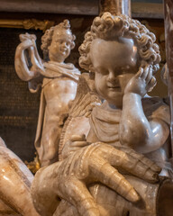 Fototapeta na wymiar Marble statues of angels in a church