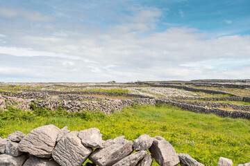 Maze of dry stone fences on Inishmore, Aran Islands, County Galway, Ireland. Irish landscape. Warm...