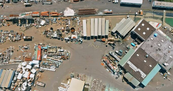 Aerial view industry recycle old machine technician separate classification part of irons metals