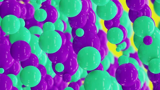 Abstract looped 3D background of green and blue spheres changing the size