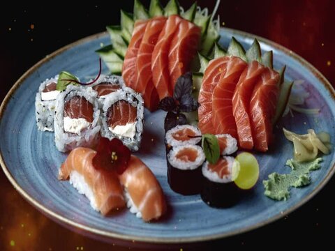 Blue plate with combo sushi, uramaki, niguiri, hossomaki and salmon on a dark background with particles