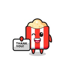 the mascot of the popcorn holding a banner that says thank you