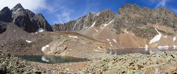 Hiking trail in Valpelline, Aosta, Italy. Panorama of Lac Mort at 2850 meters of altitude.