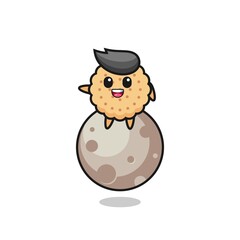 illustration of round biscuits cartoon sitting on the moon