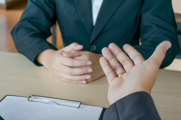 Obraz premium Team leader coach teach young workers explain on paper for business plan listen talkative coworker and discussing new project presentation Serious professional advisor consulting&nbsp;in office