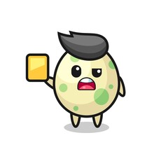 Fototapeta premium cartoon spotted egg character as a football referee giving a yellow card