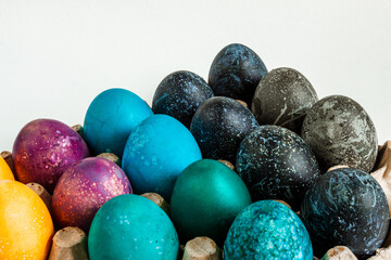 Multi-colored chicken eggs. Feast of Light Easter. Background. High quality photo
