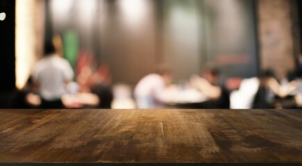 Empty wood table top and blur of night market background/selective focus .For montage product display.