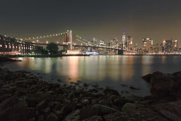 Fotobehang Brooklyn Bridge and New York City view at night on a hot summer day © Jay