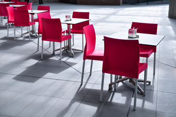 Red chairs with table