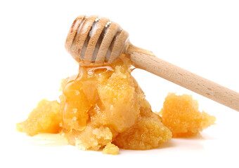 naturally crystallized rape honey on white wooden