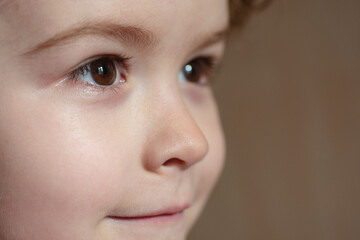 Caucasian child profile portrait close up. Kids face.