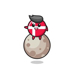 illustration of denmark flag badge cartoon sitting on the moon