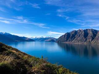 Beautiful landscape of mountain, lake and blue sky in Wanaka, south island, New Zealand.