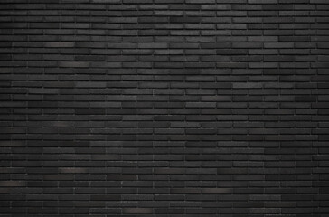 Dark retro brick wall texture background.  Vintage brickwork pattern