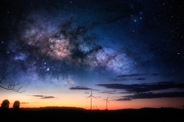 Fototapeta na wymiar Wind turbine under stars