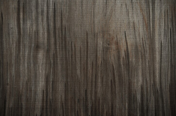 Old wood veneer texture background. Weathered vintage dark brown wooden board