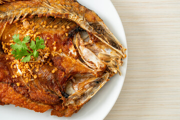 Fried Sea Bass Fish with Garlic