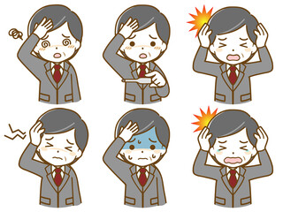 頭痛がしているスーツの中年男性