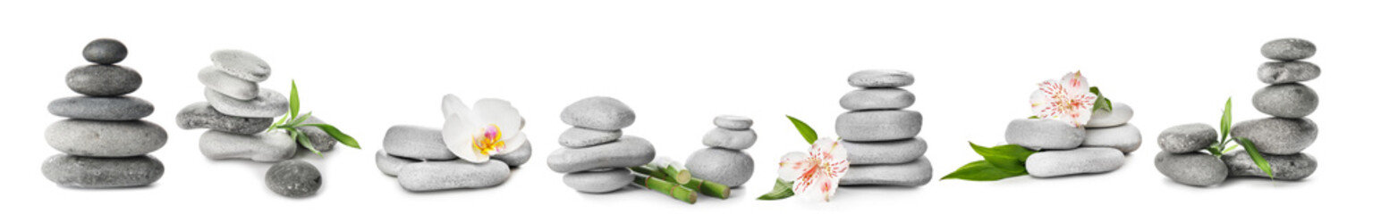 Spa stones with flowers on white background