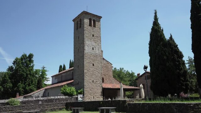 Muggia, Italy. June 13, 2021 view of the church of St. Mary Assunta in the old Muggia archaeological park