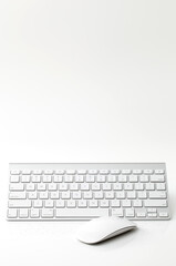 White computer mouse keyboard on white background