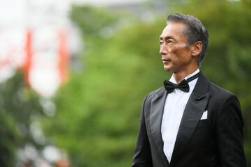 実業家　タキシード姿の男性　日本人　