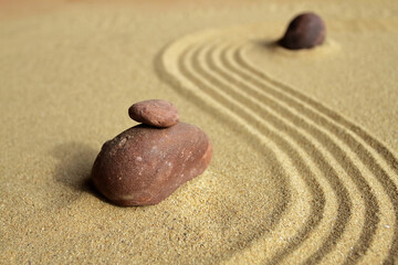 Fototapeta na wymiar Close-up of stacked stones in japanese zen garden
