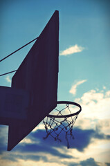 silhouette of bouncing board and basketball hoop