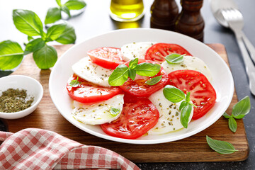 Caprese Salad with fresh tomatoes, basil and mozzarella cheese