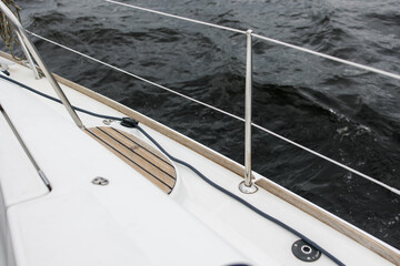Boat trip on the river. Details about the sailing yacht. In the summer, we go by boat. A white...