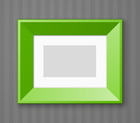 Horizontal Photo frame with paper passepartout for picture hanging on wall with striped wallpaper background.