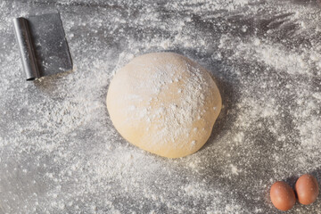  Dough makes fresh bread on the kitchen table.