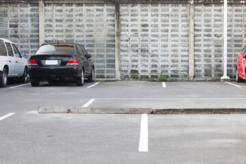 Car park lot with car in urban, Thailand.