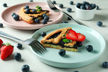 Concept of delicious food with blueberry pie, close up