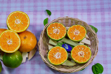 orange and tangerine isolate on table