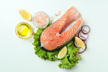 Concept of cooking salmon on white background