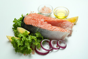 Concept of cooking salmon on white background