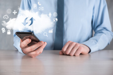 Cloud technology. cloud storage sign with two arrows up and down on dark . Cloud computing, big data center, future infrastructure, digital ai concept. Virtual hosting symbol