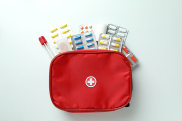 First aid medical kit on white background