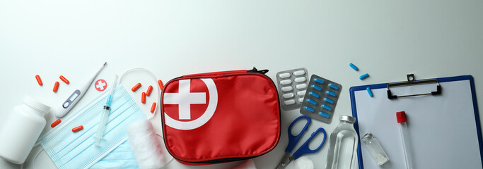 First aid medical kit on white background