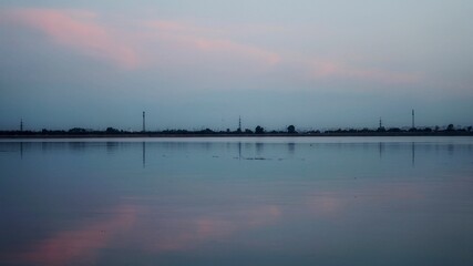 Fototapeta premium evening over the river. evening by the lake. evening sky by the river.