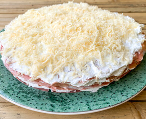 soft focus image of red velvet crepe mille cake.