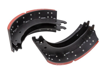 drilled brake pads with truck brake pads on an isolated white background. A two-part set