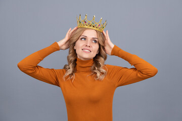 pretty blonde woman with curly hair wear crown, selfish