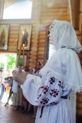 Young people dressed in vintage outfits to get married in the church. Reconstruction of Cossack customs in Ukraine. Old Slavic customs and traditional historical costumes. Stylized wedding