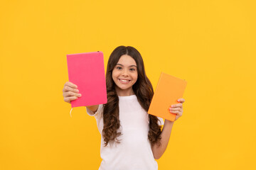 smiling school child ready to study show notepad, school