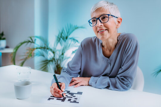 Crosswords. Cognitive Rehabilitation Therapy for Senior Woman.
